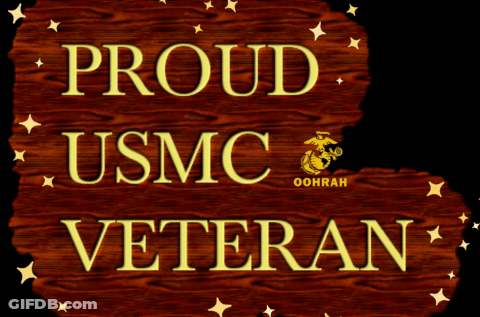 Wooden Sign Saying Proud USMC Veteran GIF