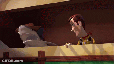 Woody And A Toy Shark From Toy Story GIF