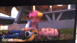 Woody And Bo Peep Laying On Ground GIF