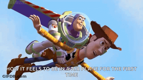 Woody And Buzz Lightyear Flying Through Air GIF