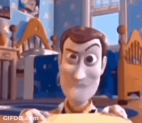 Woody From Toy Story Is Holding A Piece Of Paper In His Hands In A Bedroom . GIF