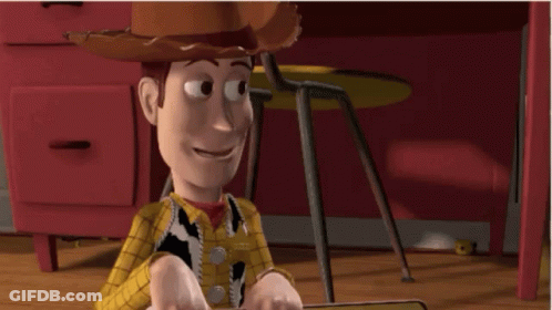 Woody From Toy Story Is Sitting In Front Of A Desk And Chair GIF