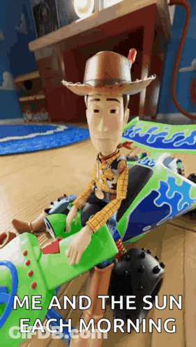 Woody From Toy Story Is Sitting On Top Of A Toy Car . GIF