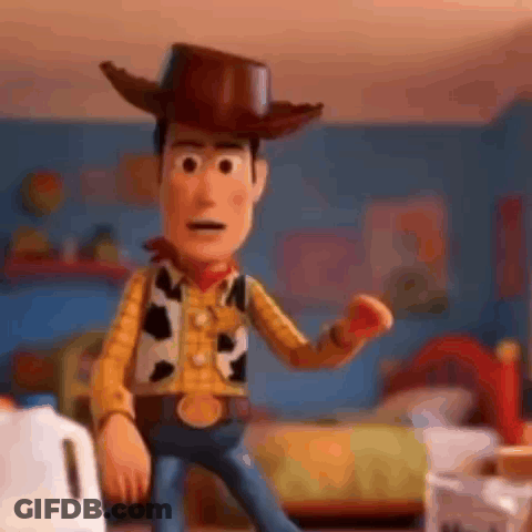 Woody From Toy Story Is Standing In A Room Holding A Red Apple . GIF