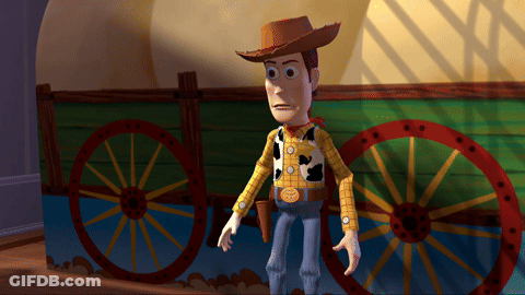 Woody From Toy Story Is Standing In Front Of A Green Wagon GIF