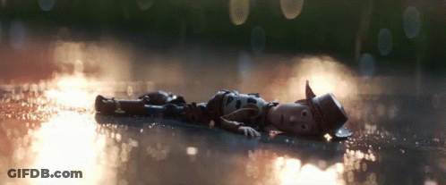 Woody From Toy Story Lying In Rain GIF