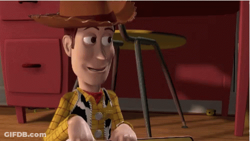 Woody From Toy Story Sits On The Floor With His Feet Up GIF