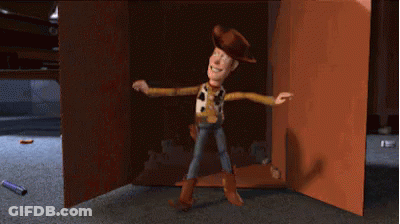 Woody From Toy Story Standing In A Doorway GIF