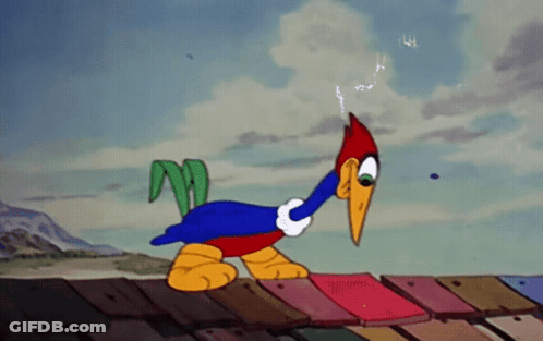 Woody Woodpecker Standing On Roof With Lightning Bolt Out Of Mouth GIF