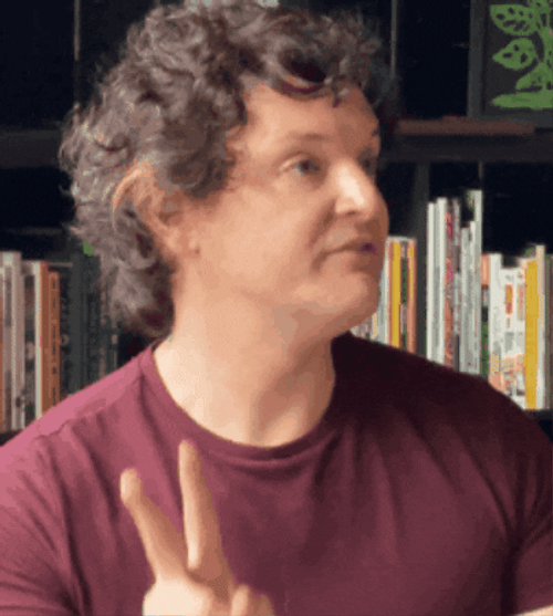 Word Salad Curly Guy Talking Gibberish GIF