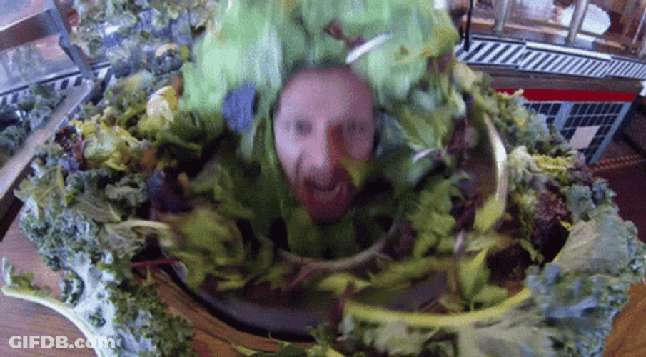 Word Salad Silly Guy Bathing In Salad GIF