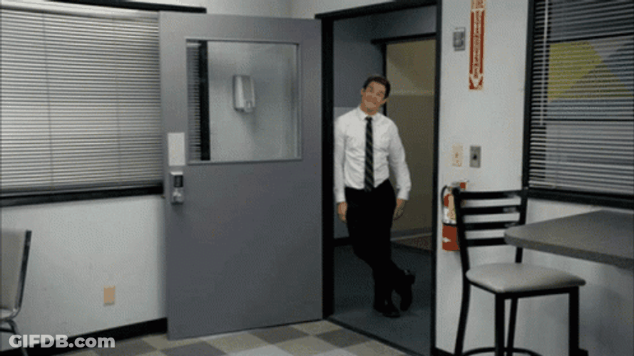 Workaholics Adam Smiling At The Door Frame GIF