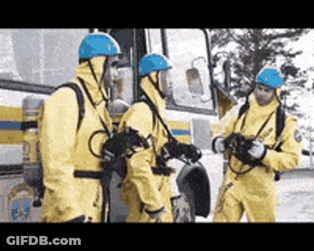 Workers On Break Removing Hazmat Suit GIF