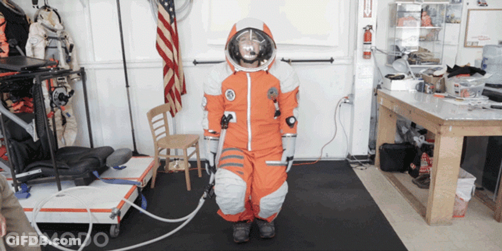 Working Out In Hazmat Suit From Outerspace GIF
