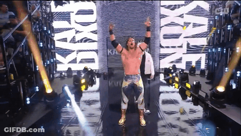 Wrestler Arms In Air With Kayfabe GIF
