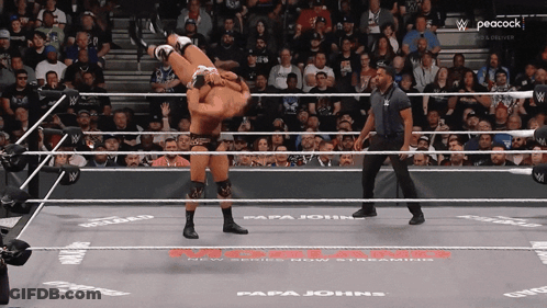 Wrestler Being Lifted In Ring GIF