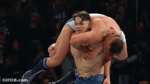 Wrestler Carrying Another Wrestler On Shoulders GIF