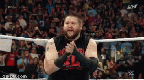 Wrestler Clapping In Ring With Crowd Watching GIF