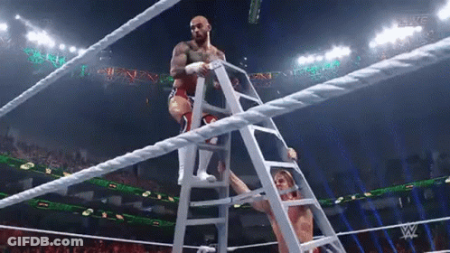Wrestler Climbing Ladder Into Ring GIF
