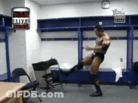 Wrestler Dancing In Locker Room With Chair GIF