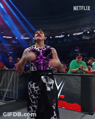 Wrestler Flexes Muscles Before Crowd And Netflix Sign GIF