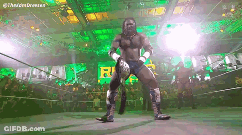 Wrestler Holding Championship Belt GIF
