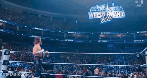 Wrestler Holding Championship Belt At WrestleMania Vegas GIF