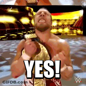 Wrestler Holding Championship Belt GIF