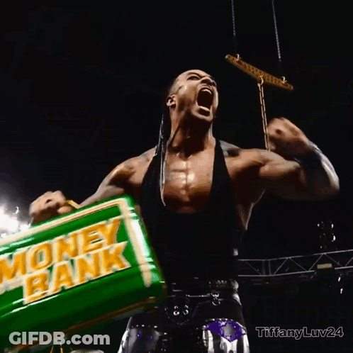 Wrestler Holding Green Money Bank GIF
