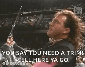 Wrestler Holding Gun Saying You Say You Need A Trim Well Here Ya Go GIF