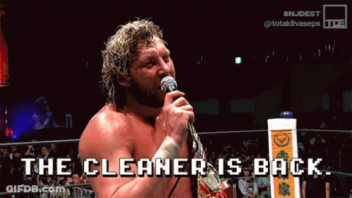 Wrestler Holding Microphone Says The Cleaner Is Back GIF