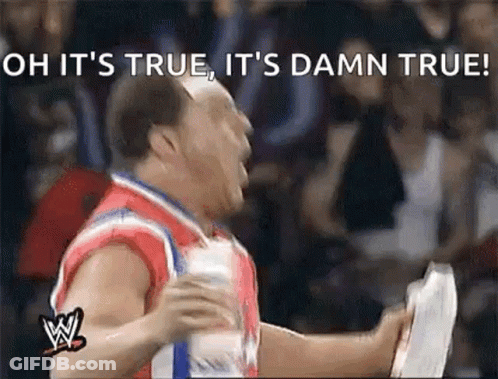 Wrestler Holding Paper Screaming At Crowd GIF