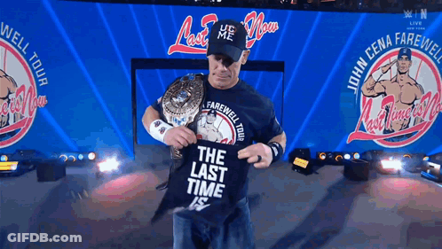 Wrestler Holding Shirt Saying The Last Time GIF