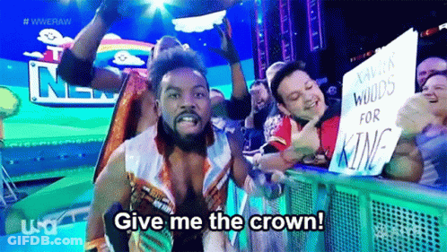 Wrestler Holding Sign Give Me The Crown GIF