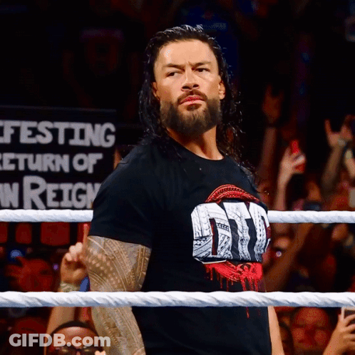 Wrestler Holding Sign Return Of Reign GIF