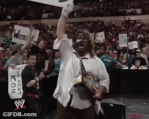 Wrestler Holding Trophy Crowd Sign The Next Icon GIF