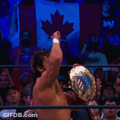 Wrestler Holding United States Championship Belt GIF