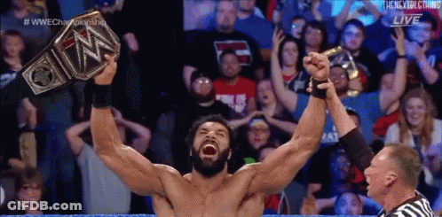 Wrestler Holding Up WWE Championship Belt GIF