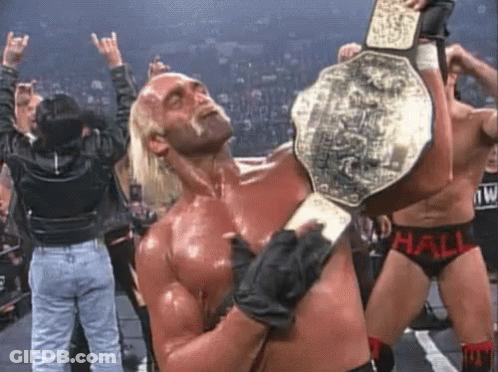 Wrestler Holding World Championship Belt GIF