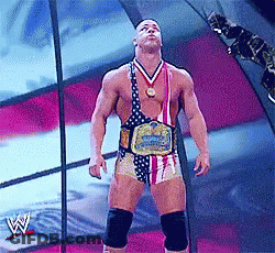 Wrestler In American Flag Outfit And Wrestling Belt GIF