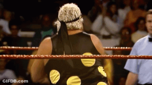 Wrestler In Black And Yellow Polka Dot Shirt GIF