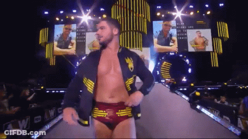 Wrestler In Black Jacket With Crown GIF