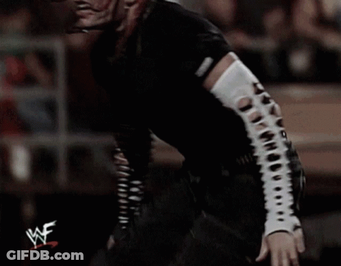 Wrestler In Black Shirt With WF On Sleeve GIF