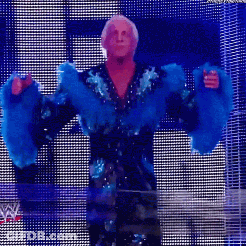 Wrestler In Blue Fur Coat GIF