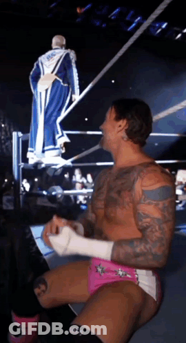 Wrestler In Blue Robe Number 666 GIF