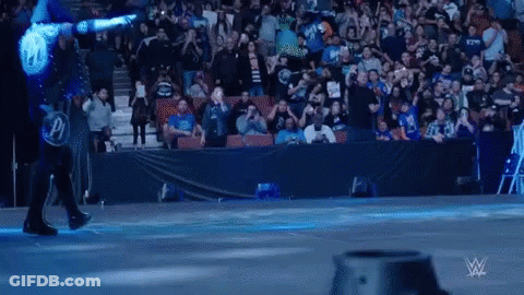 Wrestler In Blue Shirt With P GIF