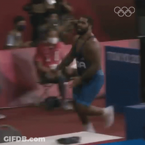 Wrestler In Blue Uniform Running On Track GIF