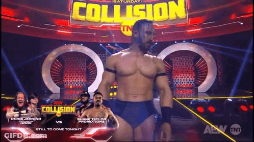 Wrestler In Front Of Collision Sign GIF