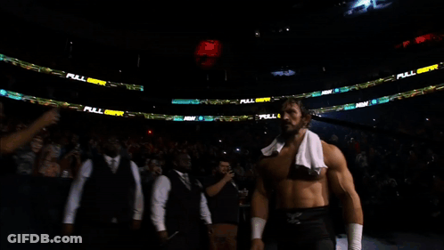 Wrestler In Front Of Full Gear Sign GIF