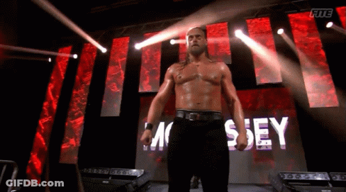 Wrestler In Front Of Large Screen Mc Sey GIF